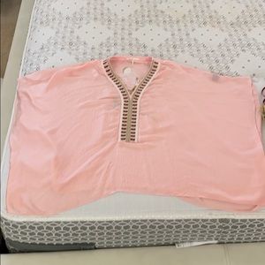 Pink armless blouse